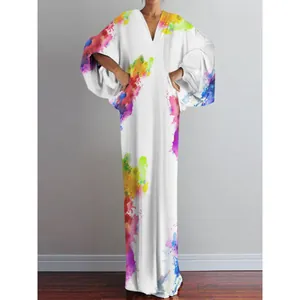 Full-length view of a loose maxi dress featuring a vibrant rainbow watercolor print