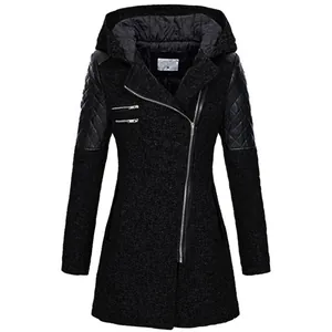 Close-up of women's black hooded wool coat with asymmetrical zipper and quilted sleeves