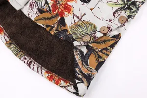 Close-up of floral print jacket with soft plush lining and rustic wooden buttons
