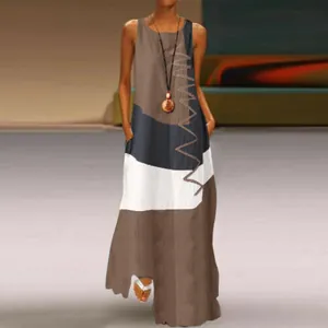 Vintage sleeveless maxi dress featuring an abstract geometric color-block print and handy pockets