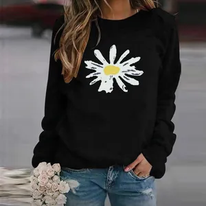 Close-up of women's black crew neck sweatshirt with a white daisy graphic print