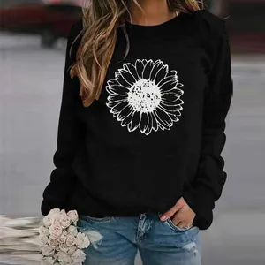 Detailed look at the white sunflower print on a black casual long sleeve sweatshirt