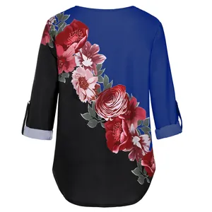 Back view detail of elegant women floral print shirt with blue and black patchwork panels