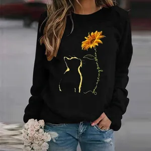 Detailed view of the cat and sunflower print on a black casual long-sleeved sweatshirt