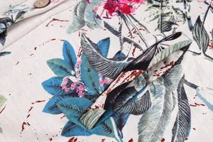 Macro detail of a floral print winter coat featuring a pocket and textured fabric