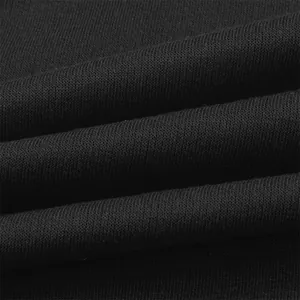 Macro detail showing the soft texture and knit pattern of the black sweatshirt fabric.