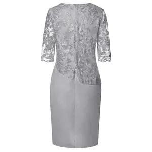 Back view of silver lace patchwork midi dress with floral embroidery and mid-sleeves