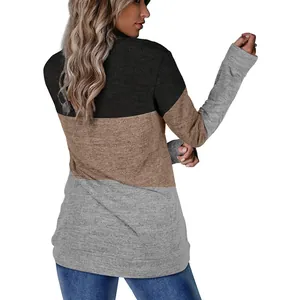 Detailed back view of women's casual color-block sweatshirt in black, tan and grey knit