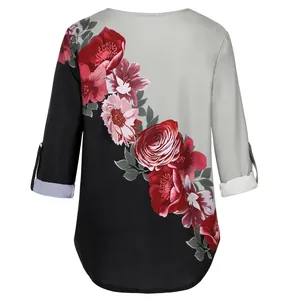 Detailed back view of vintage floral print blouse with black and grey patchwork