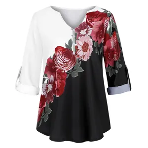 Elegant women's V-neck blouse featuring a chic black and white color block floral print