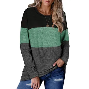 Detail view of women's long sleeve crew neck sweatshirt with stylish color block design