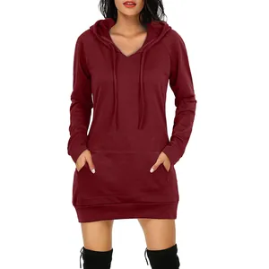 A detailed view of long-sleeve maroon hooded sweatshirt dress with a front pocket