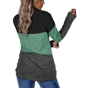 Back view of women's color-block long sleeve sweatshirt in black, green, and grey