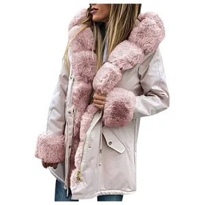 Side view detail of women's warm hooded parka with luxurious pink faux fur trim.