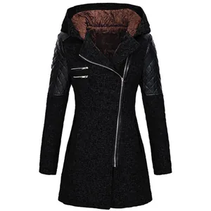 Front view of a dark woolen coat with an asymmetric zipper and quilted sleeves.