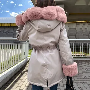 Stylish back view of women's warm hooded padded jacket with pink faux fur collar