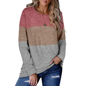 Front view of women's long-sleeve sweatshirt featuring red, tan, and gray color-block design.