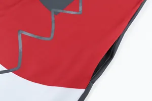 Close-up detail of the side pocket and zigzag pattern on a red vintage summer dress