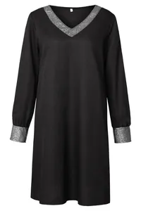 Black V-neck long sleeve dress featuring sparkling silver sequin trim on neck and cuffs