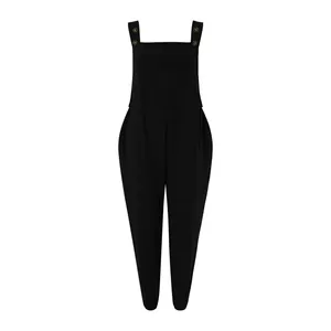 Professional detail shot of black cotton linen jumpsuit overalls with buttons and pockets
