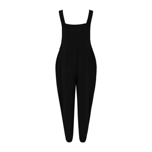 Full front view of elegant black cotton linen jumpsuit featuring wide straps and tapered legs