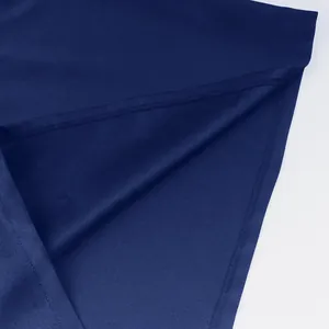 Detail of high-quality dark blue fabric with clean stitching for a medieval tunic top.