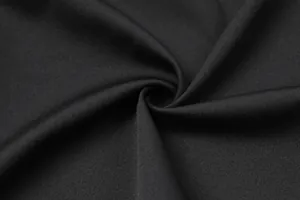 High-resolution close-up of the breathable black mesh fabric texture for bodycon dress