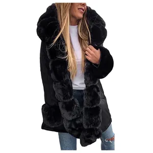 Elegant women's black winter coat featuring a large luxurious faux fur hood and trim