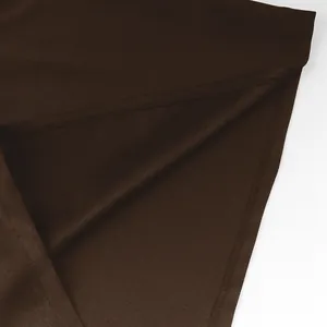 High-quality close-up showing the durable stitching and fabric texture of a brown medieval tunic
