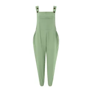 Detailed view of women's light green cotton linen overalls with pocket and button straps