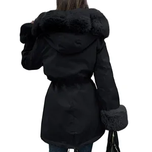 Back view of women's black hooded winter parka with luxurious faux fur trim on hood and cuffs