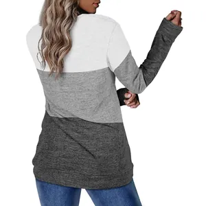 Back view of a women's color-block sweatshirt featuring white and gray tones in a casual style