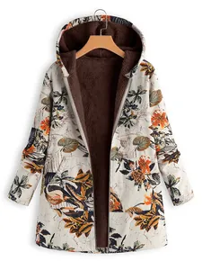 Detailed macro view of vibrant floral print and thick brown plush fleece lining on hooded coat