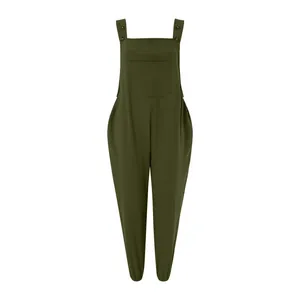Close-up of olive green cotton linen jumpsuit with button straps and front pocket