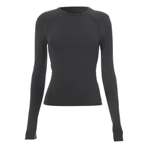 Front view detail of a black slim-fit long-sleeved shirt with raglan sleeve design.