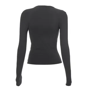 Detailed back view of a slim fit black long sleeve raglan T-shirt for women's base layer