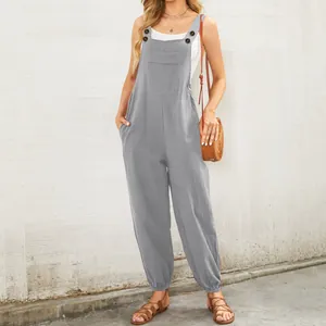Comfortable gray cotton linen overalls for women with front pockets and buttoned straps