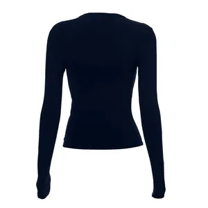 Rear view of a black slim-fit long-sleeve crew neck top featuring comfortable raglan sleeves