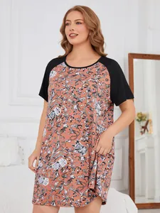 Plus-size floral print nightgown with black raglan short sleeves in bedroom