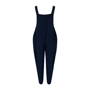 Women's navy blue cotton linen jumpsuit with wide straps and tapered leg silhouette
