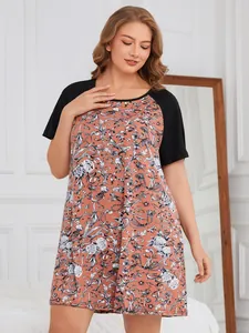 Detailed view of vintage floral print and black raglan sleeves on plus size nightgown