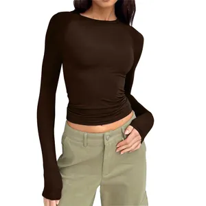 Detail of a slim fit brown raglan long sleeve T-shirt for women's casual wear
