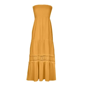 Robe maxi jaune sans bretelles style bohème avec empiècements en dentelle et jupe à volants