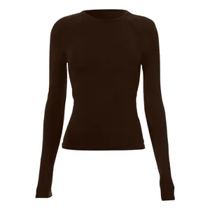 Close-up of a women's dark brown slim fit raglan long sleeve T-shirt base layer