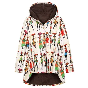 Detail view of the African-style print and warm brown plush lining of the hooded jacket.
