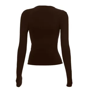 Back view of a dark brown long sleeve raglan T-shirt with a slim fit silhouette