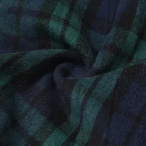 Primer plano de la textura de tela a cuadros vintage verde y azul para falda lápiz