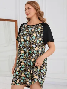 Detailed shot of plus size women's floral nightdress featuring comfortable raglan sleeves.