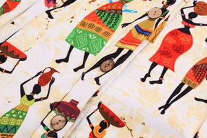 Close-up detail of African ethnic print fabric and vintage wooden buttons on a coat.