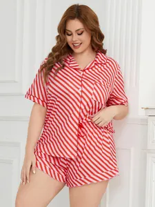 Detail view of plus size striped pajama set with red and white diagonal patterns